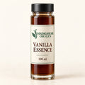 Madagascar Origin Vanilla Essence 100 ml in a glass tube with an ivory label and black cap - packaging mockup