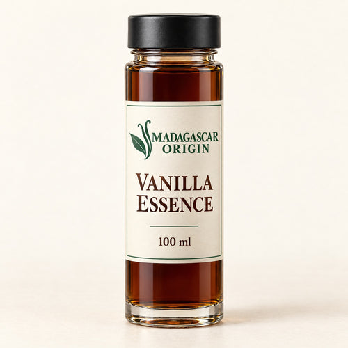 Madagascar Origin Vanilla Essence 100 ml in a glass tube with an ivory label and black cap - packaging mockup