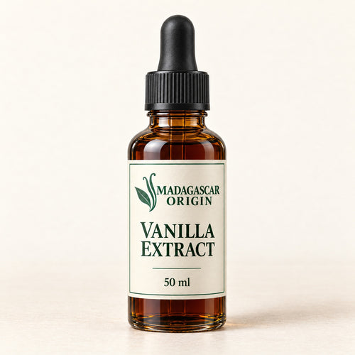 Madagascar Origin Vanilla Extract 50 ml in an amber glass dropper bottle with an ivory label and black pipette cap - packaging mockup