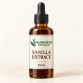 Madagascar Origin Vanilla Extract 100 ml in an amber glass dropper bottle with an ivory label and black pipette cap - packaging mockup